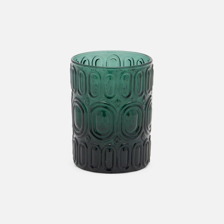 A dark green textured glass tumbler with a raised geometric pattern, shown on a light gray background.