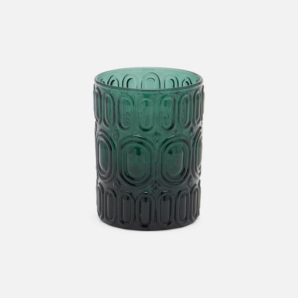 A dark green textured glass tumbler with a raised geometric pattern, shown on a light gray background.