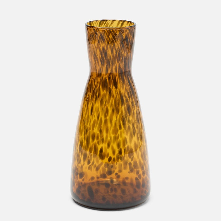 A small conical glass vase with a textured, mottled amber and gold pattern, shown against a plain light gray background.