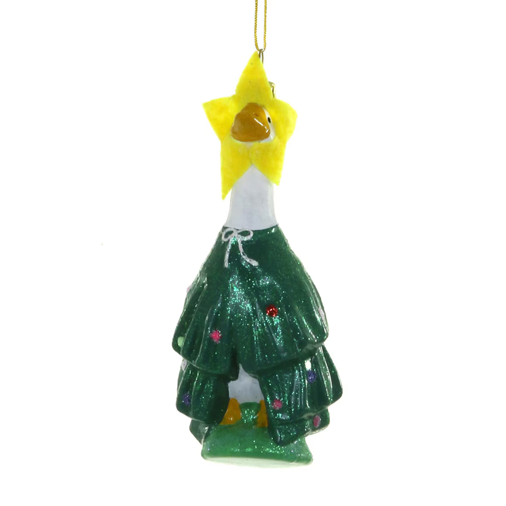A decorative hanging ornament shaped like a goose wearing a glittery green Christmas tree skirt, with a yellow star on its head and a gold hanging loop at the top, shown against a plain white background.