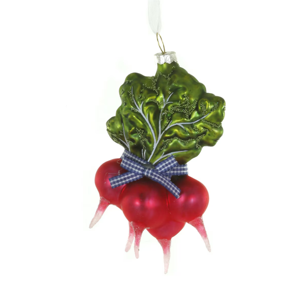A glass radish ornament with shiny red roots, green leafy tops, and a blue-and-white gingham ribbon bow, hanging against a plain white background.
