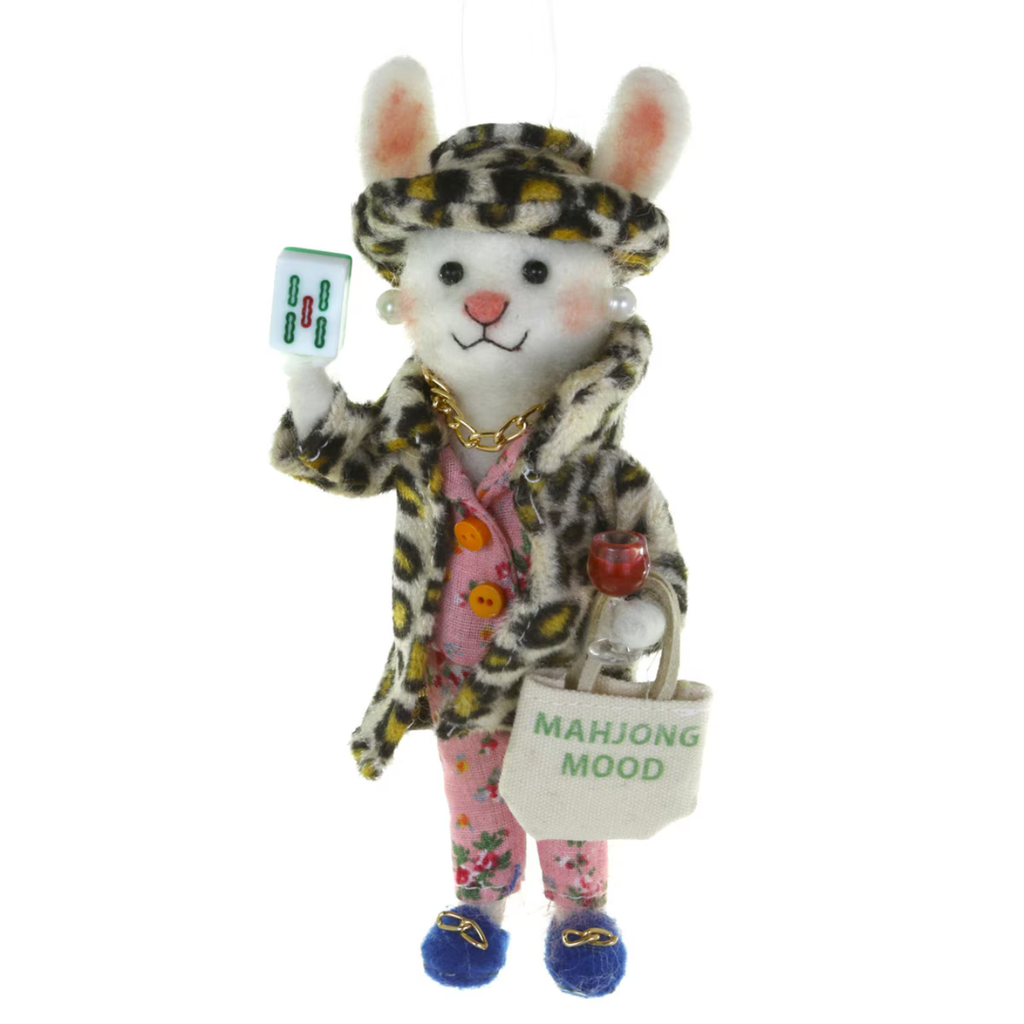 A white plush rabbit ornament dressed in a leopard-print hat and coat, pink floral outfit, blue shoes, and holding a mahjong tile and a bag that reads “MAHJONG MOOD,” on a white background.