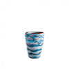A small glass tumbler with a marbled swirl pattern of blue, white, and gray, featuring a dark reddish-brown rim, set against a plain white background.