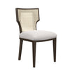 A modern side chair with a dark brown wooden frame, a woven cane backrest, and a light gray upholstered seat cushion, shown on a plain white background.