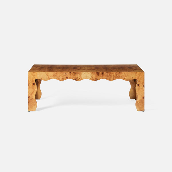 Wooden coffee table with a natural finish on a white background