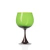 Green wine glass on a white background