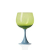 Green wine glass with a blue stem on a white background
