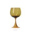 Green wine glass on a white background