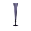 A tall, slender dark purple glass champagne flute with a flared rim and a decorative stem, shown on a clean white background.
