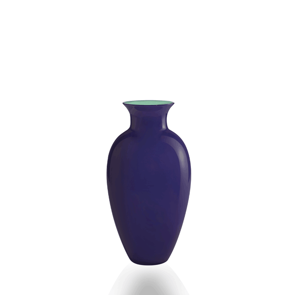 A glossy cobalt blue glass vase with a flared rim and a light green interior, shown on a clean white background with a soft reflection below.