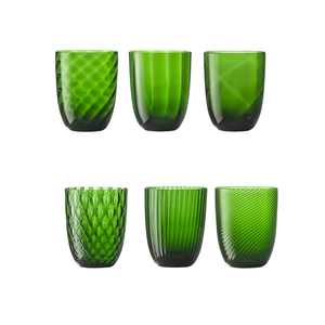 Set of  bright green water glasses on flat white background
