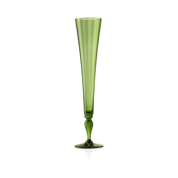 Green glass champagne flute on flat white background