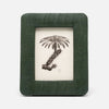 Framed artwork of a palm tree design on a white background