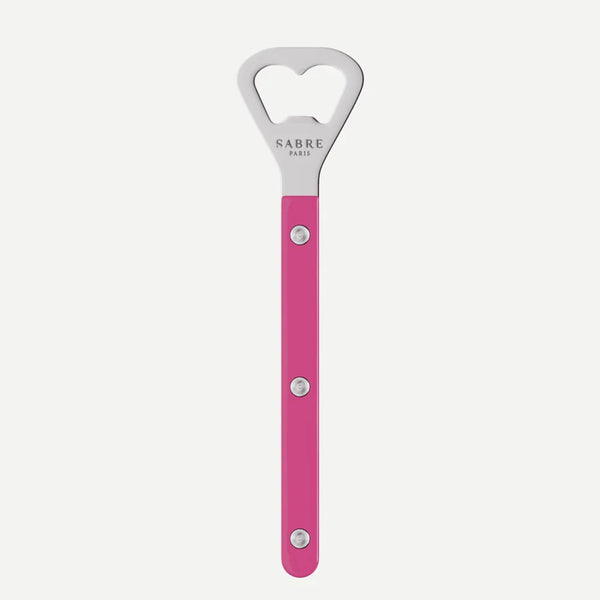 A pink and silver Sabre Paris bottle opener, shown vertically against a light gray background.