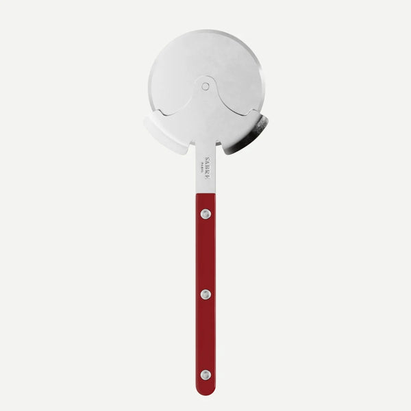 Pizza cutter with red handle on a white background