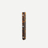 Tortoiseshell patterned handle on a white background