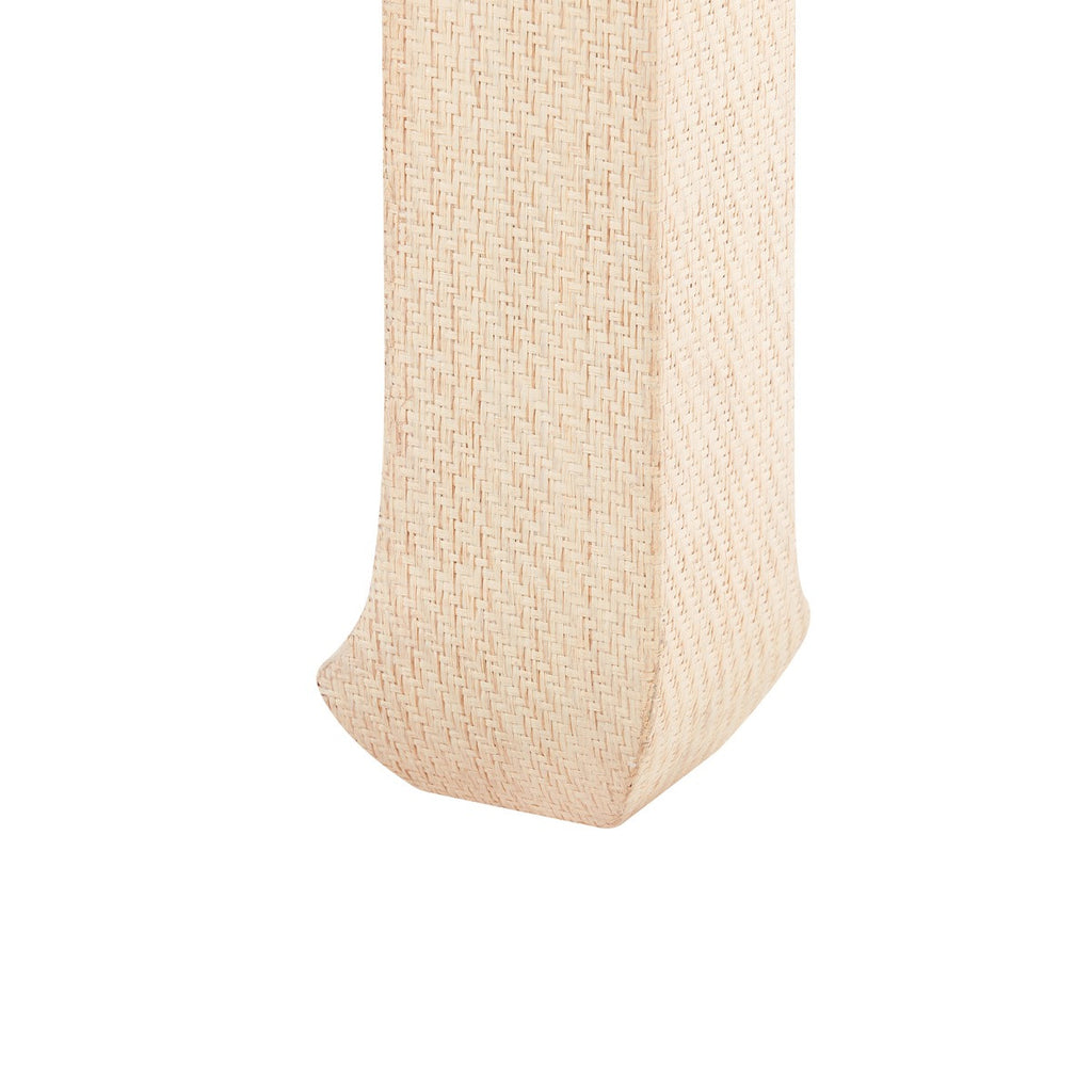 Beige woven table leg on a white background