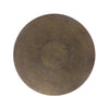 Round antiqued brass tabletop on white background