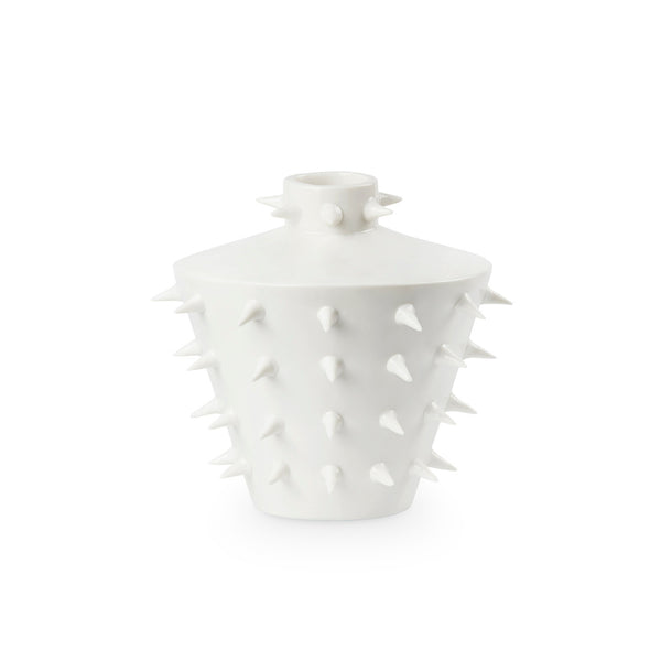 White vase with spiky texture on a white background
